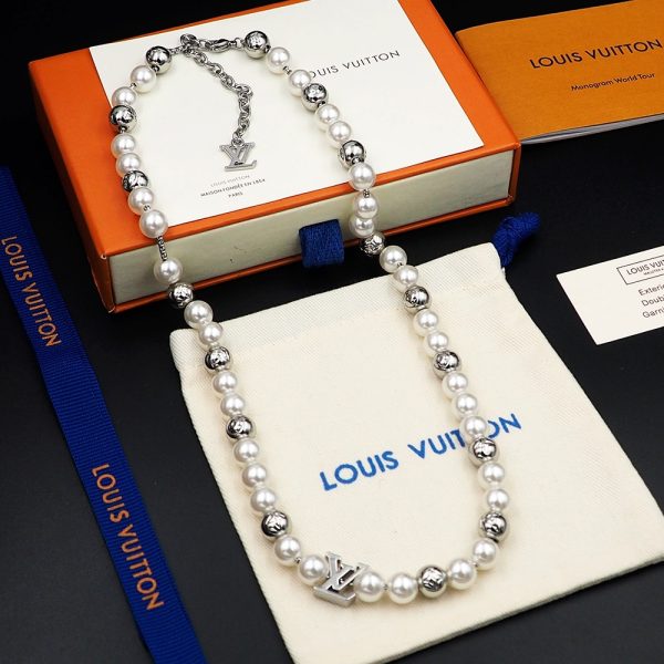 The Monogram Pierce necklace is a collection of pearl-like beads and polished beads