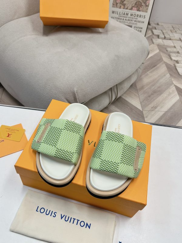 Louis Vuitton Couple's Showcase features the latest denim slippers